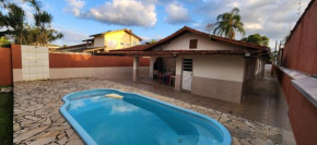 Casa em Caraguatatuba com piscina e churrasqueira